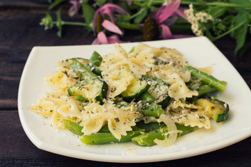 Pasta Primavera - it's delicious, hearty and healthy dishes from South Italy. Wooden rustic...