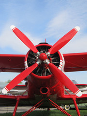 Red plane on a background of blue sky as in the film Pearl Harbor