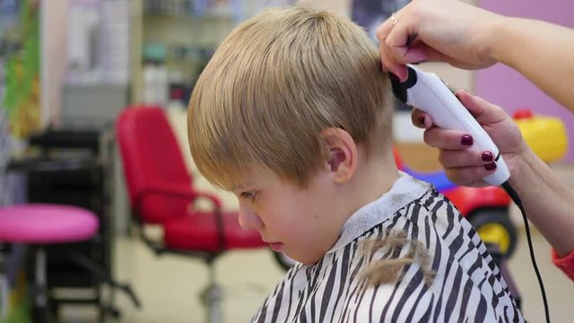 child's haircut at the Barber shop