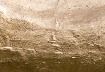 gold paint on the wall as background