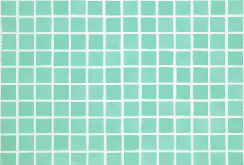 green Tiles on the wall.