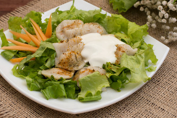Pelmeni, Traditional Russian dish on a wooden background and sacking. Close-up