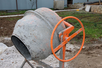 Electric concrete mixer at construction site