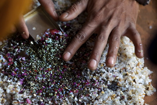 After bashing the sand, the ruby stones concentrate naturally in the middle of the container, Mogok