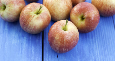 Apples on wooden background