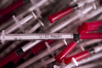Many insulin syringes
