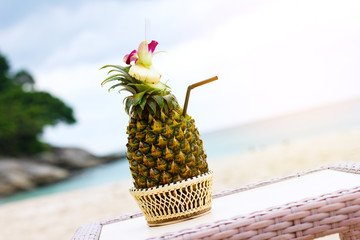 Exotic cocktail, pina colada in a pineapple