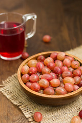 Gooseberries on a wooden background. Close-up