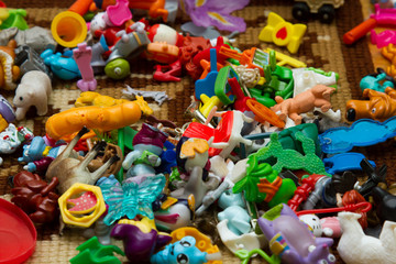 scattered small toys on the floor - obrazy, fototapety, plakaty