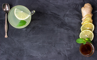 Cup of Ginger tea with lemon and honey. top view