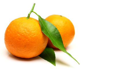 Mandarin, tangerine citrus fruit, with green leaf, isolated on white background.