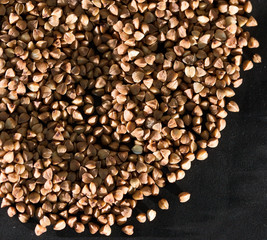 buckwheat on a black background