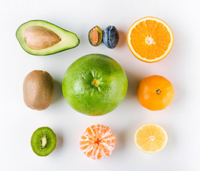 Various tropical fruits on white background