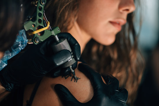 Pretty Girl Getting A Shoulder Tattoo