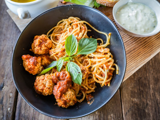 Spaghetti pasta with meatballs and tomato sauce
