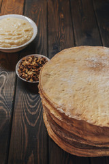 Dark and moody baking background, cake baking ingredients. Vertical image