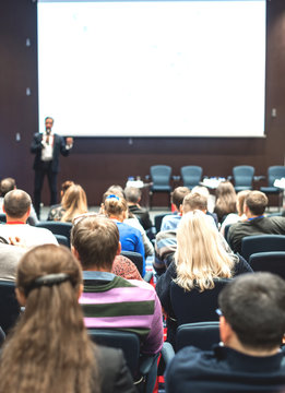 Audience at a conference presentation.