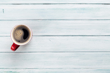 Coffee cup on wooden table