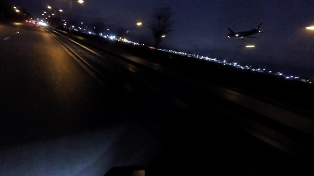 Plane landing after dark / Heathrow Airport / London - 4k