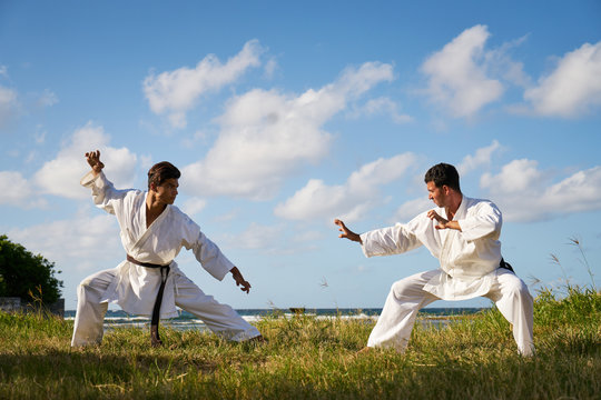 Men Kicking Punching Fighting During Combat Sport Karate Simulat