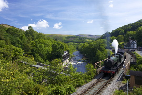 Steam train pulls out of Berwyn station on the Llangollen Heritage Railway, Dee Valley, Denbighshire, Wales