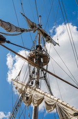Fototapeta premium Mast with sails of an old sailing vessel