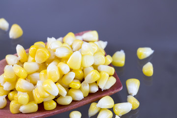 Corn on the wooden ladle