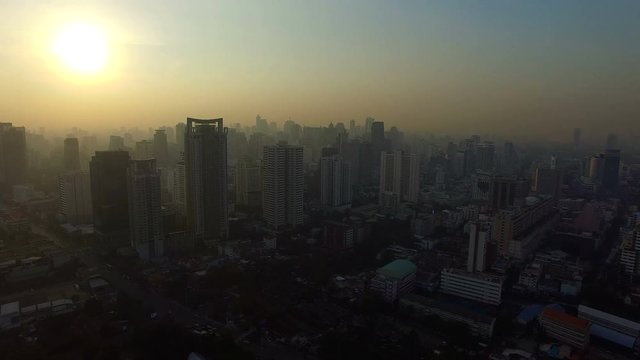 aerial view of bangkok skyscraper in foggy morning 
