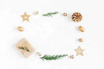 Fototapeta na wymiar Christmas composition. Gift, christmas decoration, cypress branches, pine cones. Flat lay, top view
