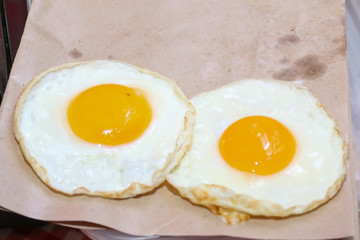 Double chicken fried eggs like an eyes