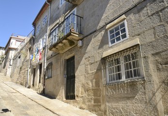 Fototapeta na wymiar Street in slope in Tui, Galicia, Spain