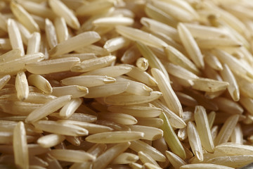uncooked grains of brown basmati rice