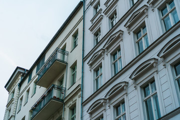 Fototapeta na wymiar typical row houses at berlin prenzlauer berg with white facade