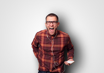 Shout, the young guy in the shirt and headphones