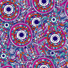 Ethnic seamless pattern with feathers and circles.