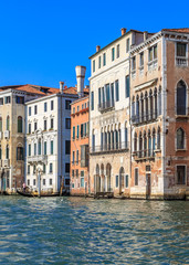 Fototapeta na wymiar Colorful weathered facades of old venetian buildings