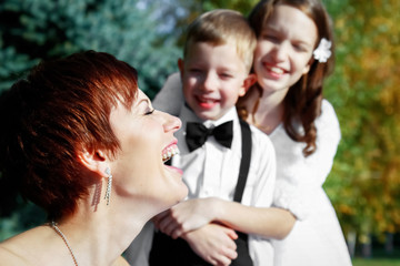 Happy bride at a wedding with children. Family values.