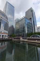 Fototapeta na wymiar LONDON, ENGLAND - JUNE 17 2016: Business building and skyscraper in Canary Wharf, London, England, Great Britain