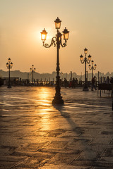 Fototapeta na wymiar Traditional Venetian lamps at sunrise. Venice, Italy.
