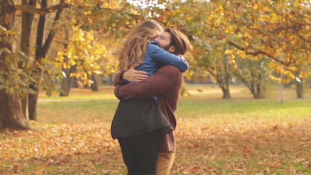 Cute couple hanging out in the park.