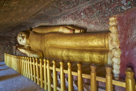 Reclining Buddha statue in the Po Win Daung Buddhist cave, dating from the 15th century, Monywa, Sagaing Division