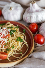 Spaguetti with tomato cheese and oregano