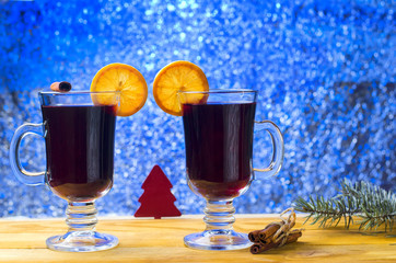 glass of mulled wine at the Christmas background