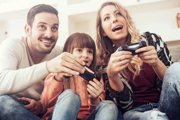 Family having fun at home © ivanko80