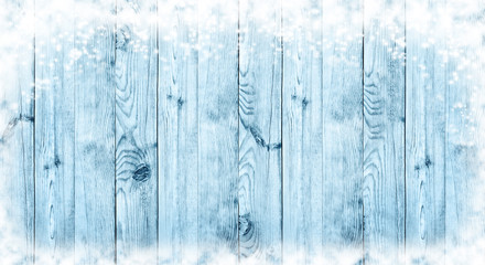 Blue Christmas background. Boards in the snow.Panorama.