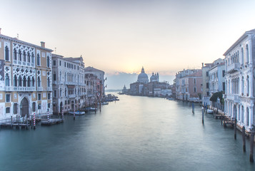 Fototapeta na wymiar Sunrise over the grand canal in Venice, Italy.