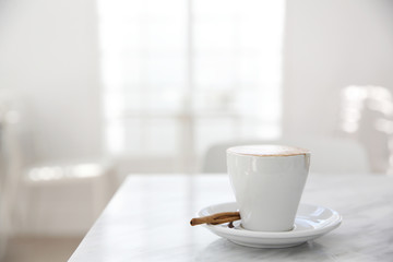 cappuccino coffee on wood background