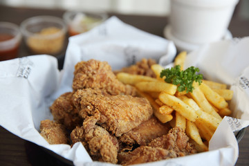 Fried chicken on wood background