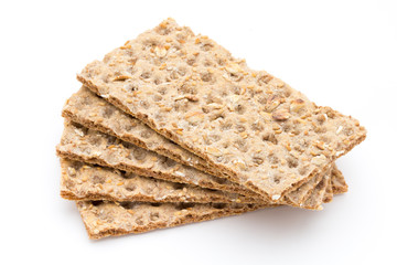 Stack of wholegrain crispy bread with sunflower, chia and sesame