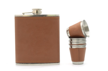 flask with iron glasses isolated on white